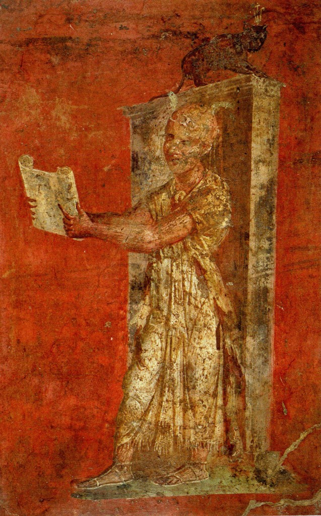 Da Pompei. Tempio di Iside, portico nord. Il sacerdote che legge sul rotolo di papiro le formule del rituale era detto hierogrammateus o anche pteroforo per le sue piume di struzzo che gli ornavano il capo. napoli, Museo Archeologico Nazionale, inv. 8925.